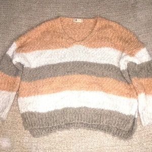 this is a very soft sweater size s/m